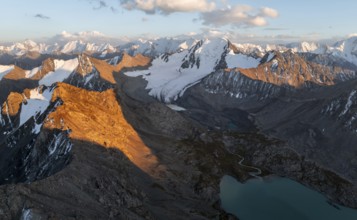 Evening mood, mountain panorama, aerial view, 4000 metre peak with glacier, mountain pass and