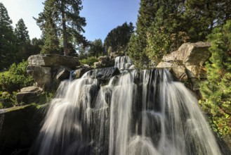 Essen, North Rhine-Westphalia, Germany - Alpinum with waterfall, Grugapark, a park in Essen,
