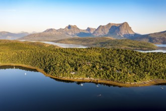 Aerial view over the fjord Efjord south of Narvik, seen at sunset, leisure boats anchor, holiday