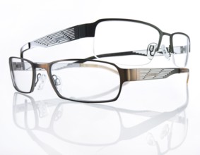 Two stylish glasses from JAGUAR on a white background, studio shot
