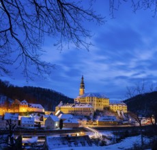 Winter evening in the Müglitz valley, impressively illuminated Weesenstein Castle at the blue hour,