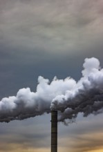 Pollution, industry, smoke pouring out of a factory chimney, Lenzing, Upper Austria, Austria,