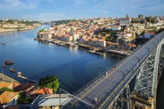 View of Porto city and Douro river and Dom Luis bridge I from famous tourist viewpoint Miradouro da