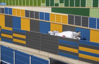Colourful noise barriers on the A52 motorway, at the Essen-Rüttenscheid junction, the noise