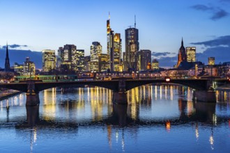 Skyline of the city centre of Frankfurt am Main, river Main, dusk, Ignatz-Bubis-Brücke, Hesse,