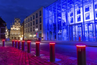 Historic old town, facade of the historic town hall, blue illuminated building of the Münster