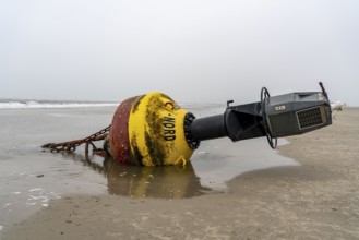 Washed up buoy, sea mark, detached in a storm, originally off the island of Norderney in the North