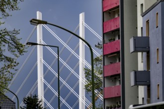The new Rhine bridge Neuenkamp, the A40, white pillar ropes, and the old motorway bridge, which is