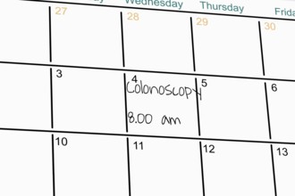 Symbolic image: Reminder of a colonoscopy in an appointment diary