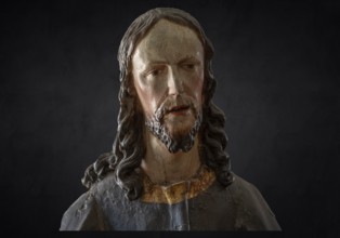 Palmesel wooden figure around 1880, Christ detail, on dark background, Dominican convent