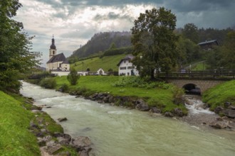 Parish church of St Sebastian, bridge, stream, rainy weather, Ramsauer Ache, Ramsau,