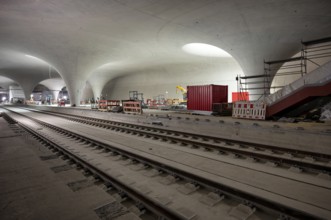 Tracks, track bed on concrete, chalice supports in the cathedral, construction site, construction