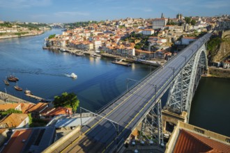 View of Porto city and Douro river and Dom Luis bridge I from famous tourist viewpoint Miradouro da