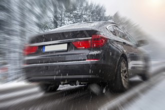 BMW on a snow-covered road (Composing)