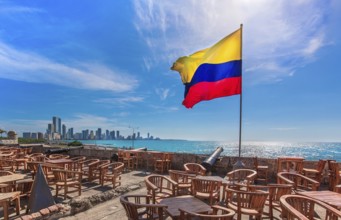 Street cafe in colonial Cartagena Walled City (Cuidad Amurrallada) overlooking scenic shoreline of