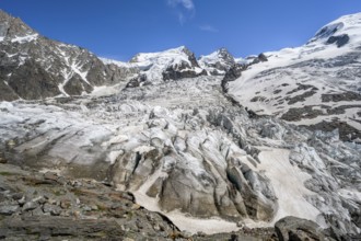 High alpine glaciated mountain landscape, La Jonction, Glacier des Bossons meets Glacier de