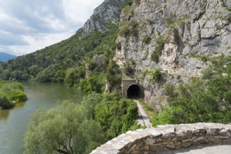 An old railway tunnel on a hiking route along a picturesque river, River Nestos or Mesta, Nestos