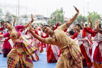 Participants with instructors dance in a Bihu dance workshop ahead of Rongali Bihu Festival, in