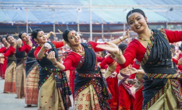 Participants with instructors dance on the final day of a Bihu dance workshop ahead of Rongali Bihu