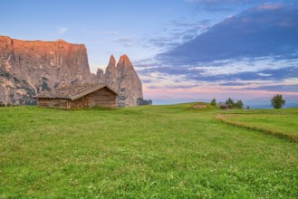 Alpine hut on the Seiser Alm, summit glow, sunrise, Schlern, Dolomites, South Tyrol, Italy, Europe