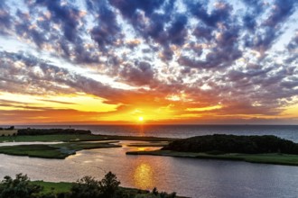 Sunset by the sea on the Baltic Sea in Heiligenhafen, Germany, Europe