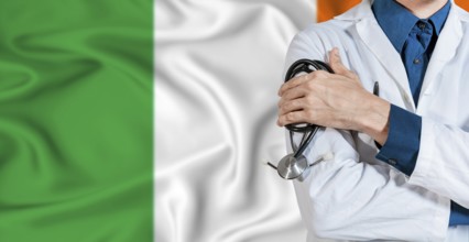 Doctor with stethoscope on Ireland flag. Doctor holding stethoscope on Ireland flag