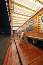 Wooden cash register on a circus illuminated at dusk, Böblingen, Germany, Europe