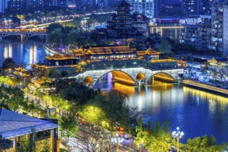 Chengdu skyline with Anshun Bridge over Jin River at night in Chengdu, China, Asia