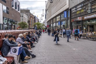 Grote Marktstraat, shopping street, long bench, pedestrian zone, in the city centre of The Hague,