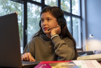 Homeschooling, girl, 11 years old, learns at home, home learning, lessons at home, distance