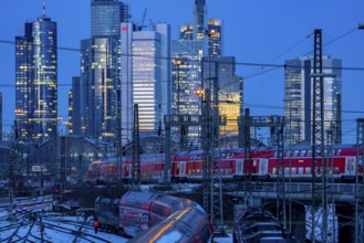 Railway tracks in front of the main railway station in Frankfurt am Main, skyline of skyscrapers in