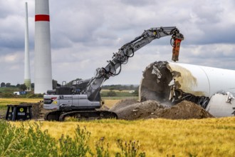 Demolished tower of a 20 year old wind turbine, in the Werl wind farm, 5 old Enercon E-66 turbines