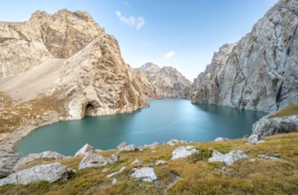 Turquoise mountain lake Kol Suu with rocky steep mountains, Kol Suu Lake, Sary Beles Mountains,