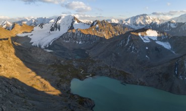 Evening mood, mountain panorama, aerial view, 4000 metre peak with glacier, mountain pass and