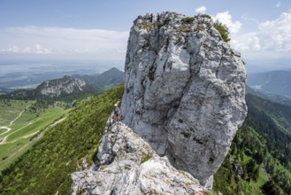 Climber with climbing rope on a climbing tour, climber on a mountain ridge, alpine climbing,