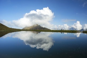 Artificially created lake, snow pond, feeds the snow cannons that completely cover the slopes of