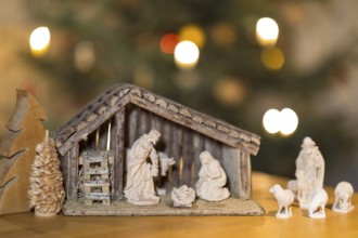 Stable with the Holy Family, shepherd and sheep come to the cot, nativity scene scene, Christmas