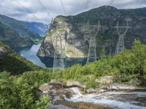High voltage power lines above the Aurlandsfjord, a branch of the Sognefjord., transports