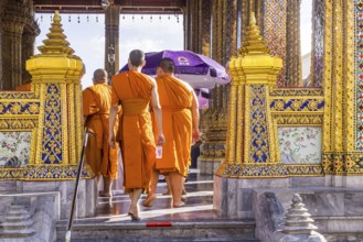 Wat Phra Kaeo temple, royal palace. Royal chapel with Buddhist monks and novices. Bangkok,