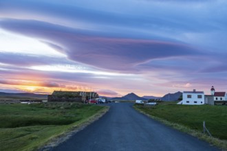 Sunset at Mödrudalur farm and guesthouse, church, dramatic cloud formation, northwest of