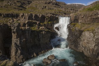 Fossardalur Waterfall close to Djupivogur at the Berufjord, Easter Iceland