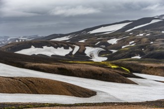 Volcanic landscape with hills and snow, Laugavegur trekking trail, Landmannalaugar, Fjallabak
