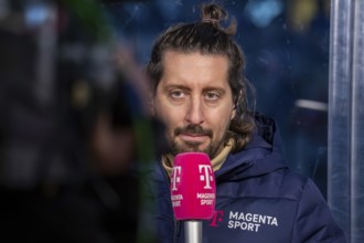 Ice hockey presenter Patrick Ehelechner at the Adler Mannheim v Nuremberg Ice Tigers match