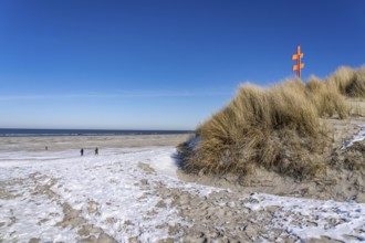 The East Frisian North Sea island of Juist in winter, dune crossing to the beach, snow, Lower