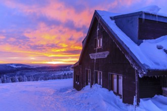 Sunset at the Wossecker Baude on a winter's day, Harrachsdorf in the Giant Mountains, Czech