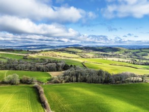 Farms over Morcombelake Village from a drone, Bridport, Dorset, England, United Kingdom, Europe