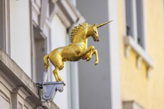 Unicorn house in Baden-Baden with sculpture of a unicorn on the façade. Baden-Baden,