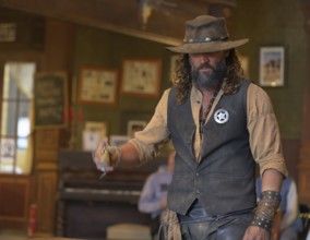 Western actor (sheriff) in the western village Fort Bravo or Texas Hollywood, Almeria, Spain,