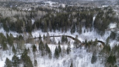 River in the boreal forest in winter. Region of La Mauricie. Province of Quebec. Canada