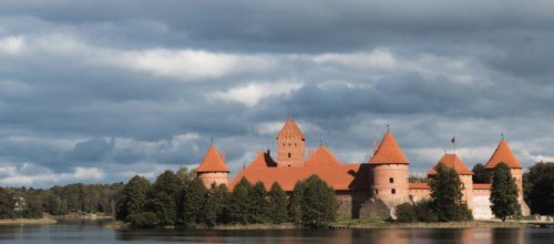 Island castle in Trakai, Lithuania with a cloudy sky in the background